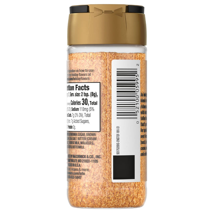A bottle of McCormick Garlic Powder with a gold lid and a label showing nutritional information and a barcode.