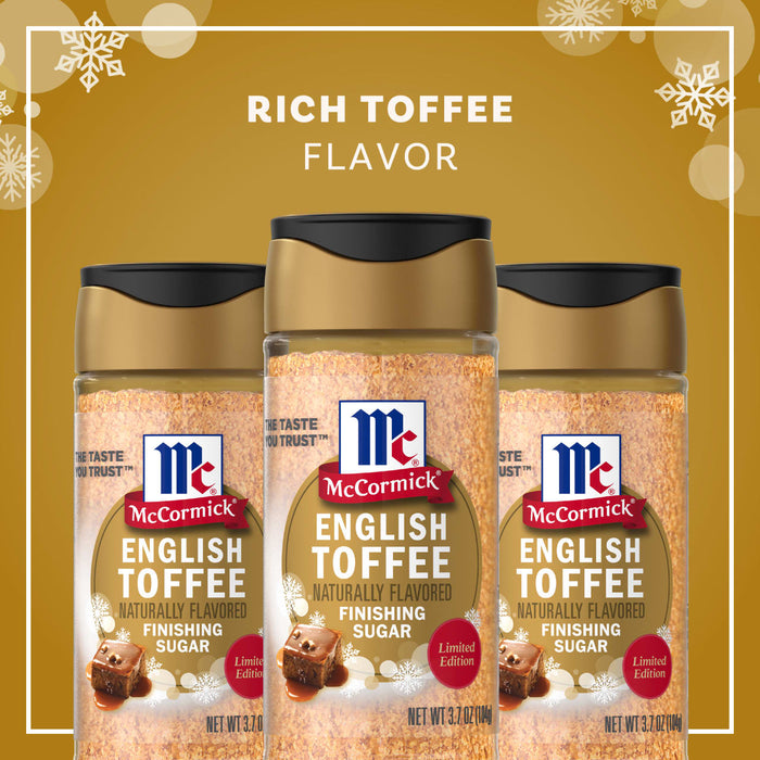 A bottle of Mccormick English Toffee Finishing Sgr 3.7 Oz is centered on a golden background, surrounded by chocolate toffee bark and loose toffee pieces, with text stating RICH TOFFEE FLAVOR.