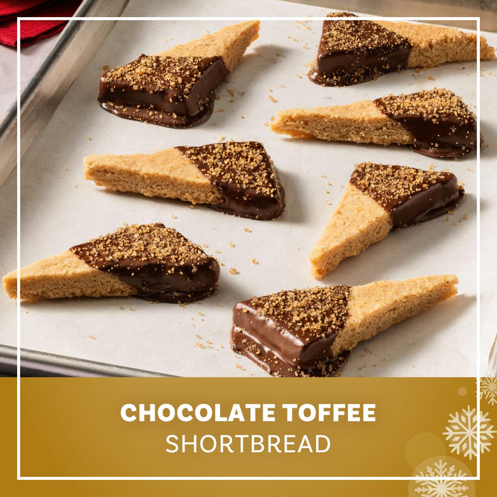 Cinnamon rolls in a dark baking dish are shown, glazed and topped with a granular sugar, promoting the versatility of Mccormick English Toffee Finishing Sgr 3.7 Oz with the overlay text "ELEVATE ANY DESSERT, DRINK, OR DISH".