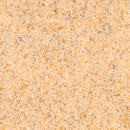 A textured surface with a speckled pattern in shades of beige and gray.