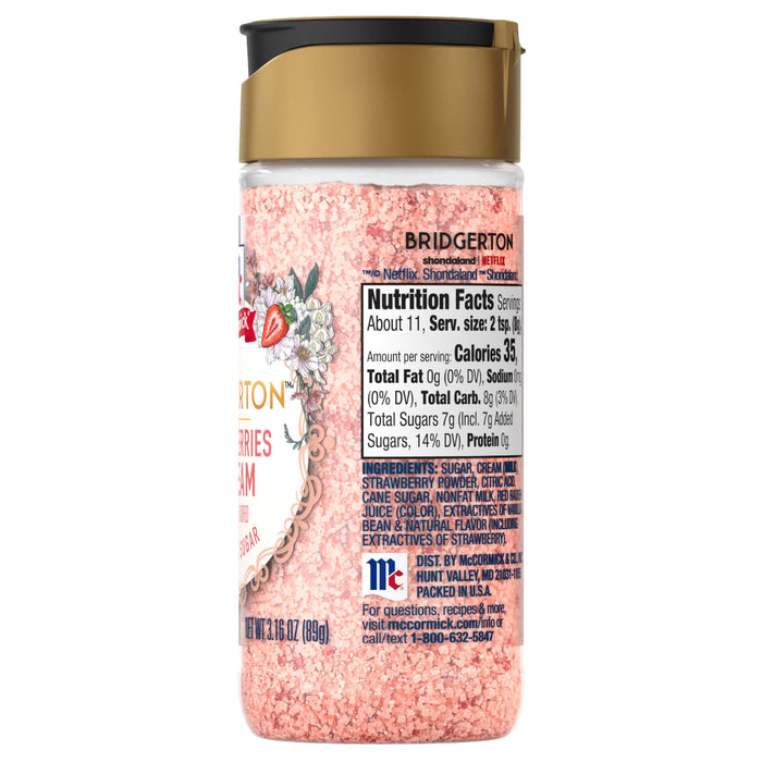 A container of McCormick Pink Lemonade Seasoning is shown, highlighting the product's branding and nutritional information.
