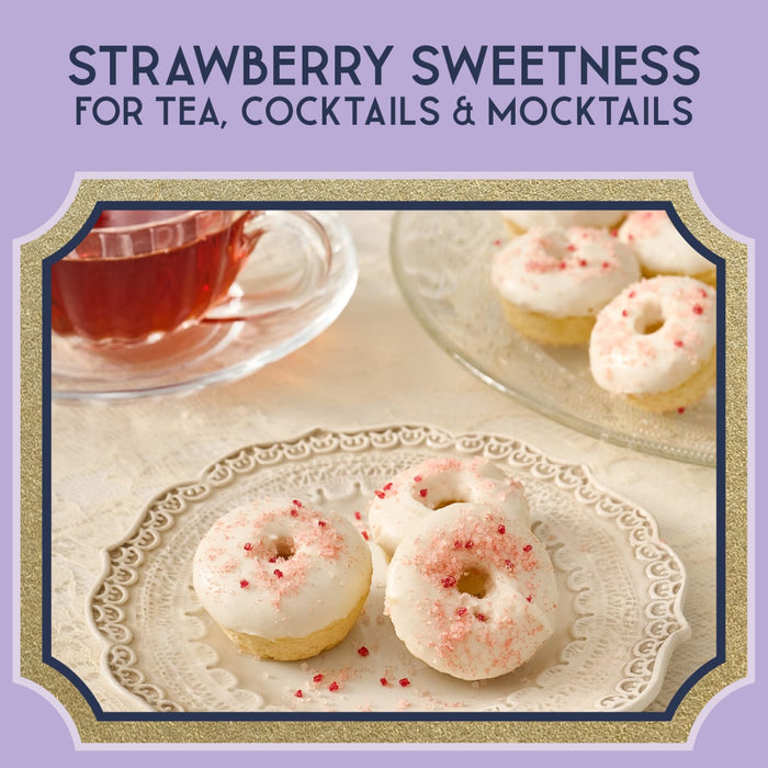 A promotional image showcasing strawberry-flavored sweetness for tea, cocktails, and mocktails, featuring mini donuts with strawberry sprinkles and a cup of tea.