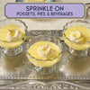 Three glass bowls filled with possets topped with whipped cream and orange zest, suggesting they can be sprinkled on possets, pies, and beverages.