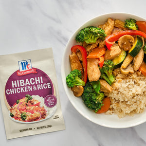 A bowl of McCormick Hibachi Chicken and Rice is shown next to the product packaging.