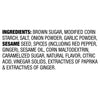 The image shows the ingredient list for a food product, including brown sugar, modified corn starch, sesame seed, and spices.