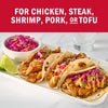 Image showcasing tacos with chicken, steak, shrimp, pork, or tofu, highlighting versatile meal options.