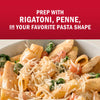 A bowl of pasta with rigatoni, penne, or your favorite pasta shape, topped with cheese.