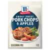 A packet of McCormick Smoky Sweet Pork Chops &amp; Apples seasoning mix.