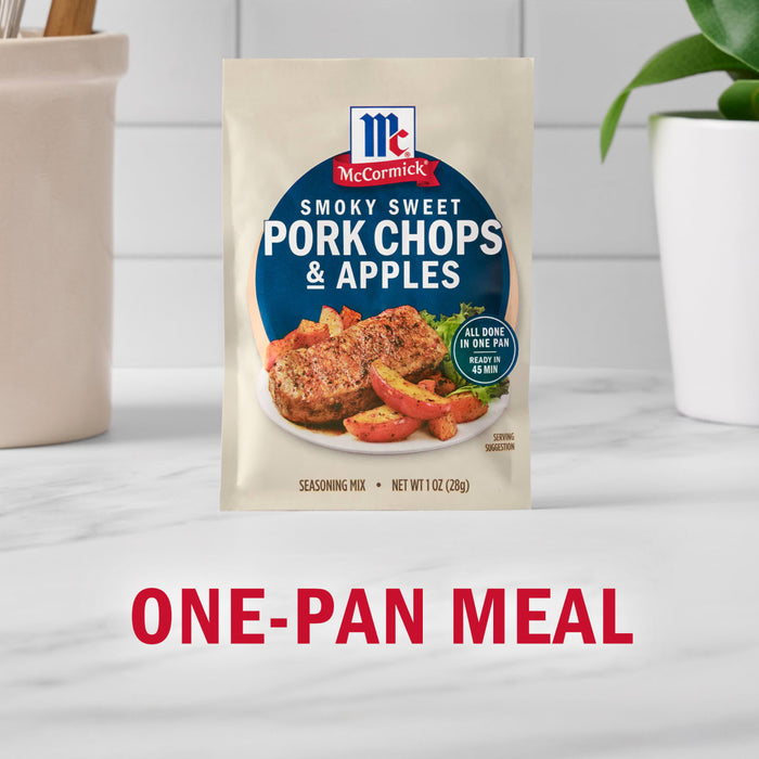 A packet of McCormick Sweet and Smoky Pork Chops &amp; Apples seasoning mix is displayed as a one-pan meal solution.