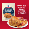 McCormick Perfect Roast Chicken &amp; Vegetables seasoning mix is shown with a prepared chicken and vegetable dish, highlighting that it's made with garlic, black pepper, and thyme.