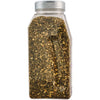 A clear plastic shaker bottle filled with a dark, speckled seasoning blend.