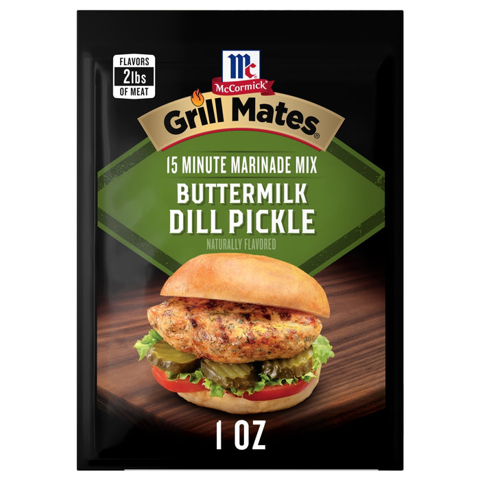A 1.0 oz packet of Mccormick Grill Mates Buttermilk Dill Pickle Seasoning Mix featuring a grilled chicken sandwich with pickles and tomatoes on a wooden surface.