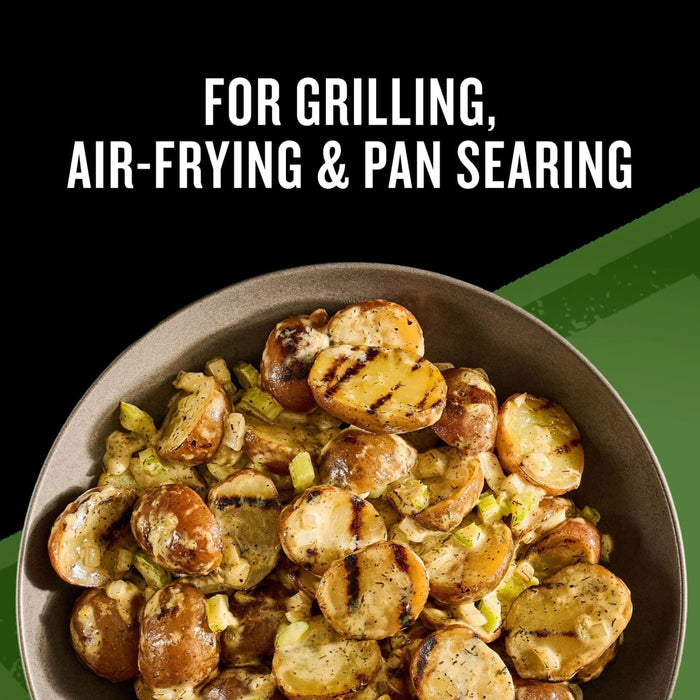A bowl of grilled baby potatoes tossed in a creamy sauce with celery and herbs illustrates the versatility of Mccormick Grill Mates Buttermilk Dill Pickle Seasoning Mix 1.0 Oz for grilling air frying and pan searing.