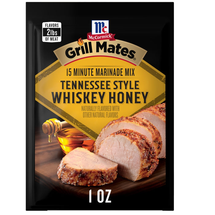 A 1.0 ounce packet of Mccormick Grill Mates Tennessee Style Whiskey Honey Marinade Seasoning Mix featuring a golden label with images of sliced roasted pork and a honey dipper.