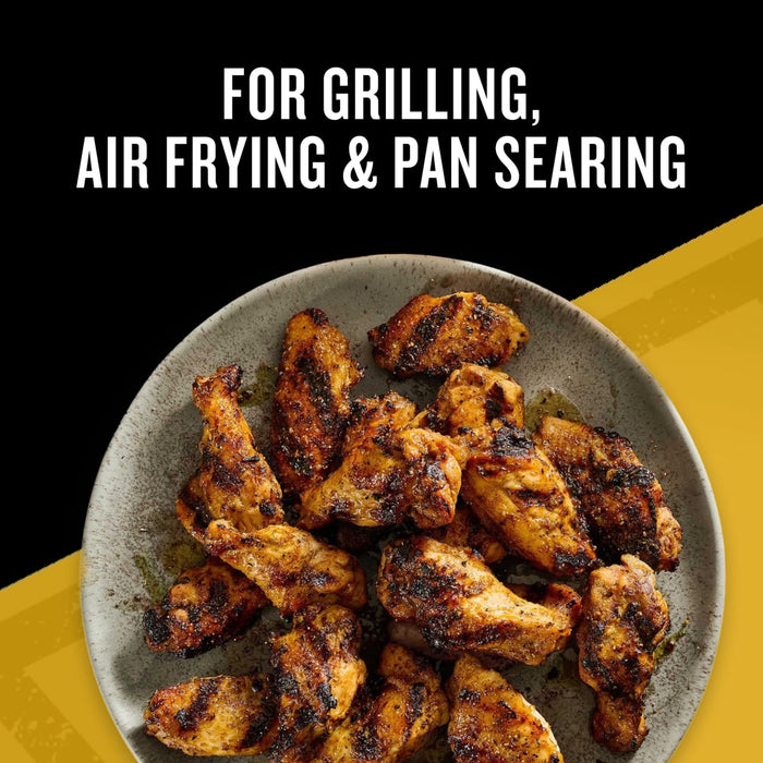 A plate of seasoned chicken wings cooked using Mccormick Grill Mates Tennessee Style Whiskey Honey Marinade Seasoning Mix 1.0 Oz with text stating it is for grilling air frying and pan searing.