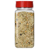 A clear plastic bottle of Mccormick, 12.2 Oz seasoning blend featuring coarse sea salt mixed with dried herbs and spices under a red flip-top lid.