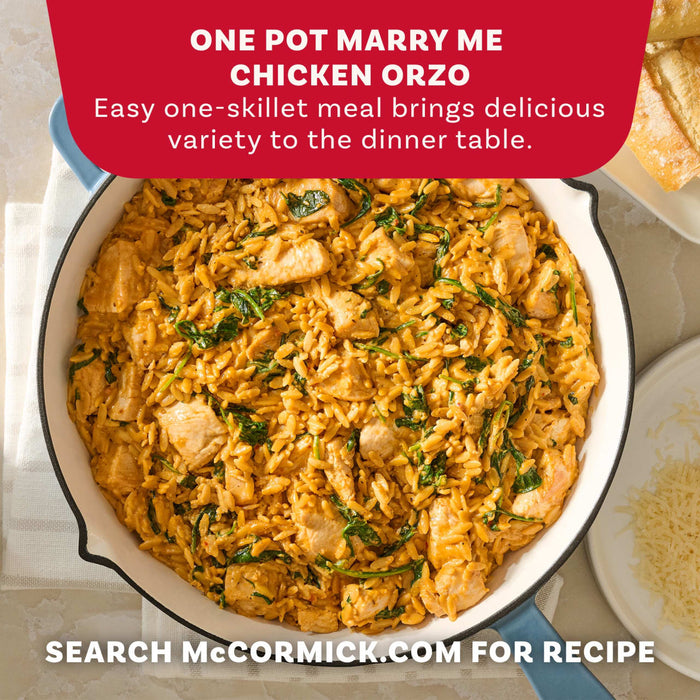 A delicious, finished skillet of One Pot Marry Me Chicken Orzo, a recipe from McCormick that can be made using Mccormick Marry Me Chicken Seasoning Mix, 0.75 Oz, is presented as an easy dinner idea.