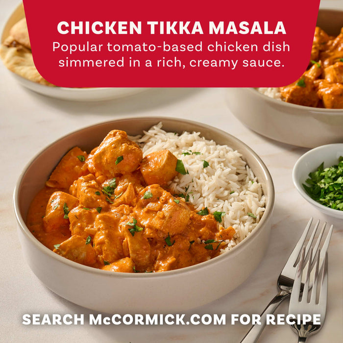 A delicious bowl of Chicken Tikka Masala and rice, prepared using Mccormick Chicken Tikka Masala Seasoning Mix, 0.87 Oz, is shown as a serving suggestion.