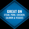 A blue diamond-shaped label highlights that the product is great on steak, pork, chicken, salmon, and veggies.