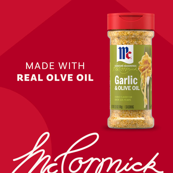 A bottle of Mccormick Garlic And Olive Oil Seasoning Blend, 5.25 Oz is shown against a red background with the text Made with Real Olive Oil.