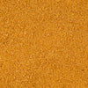 A close-up, top-down view reveals the texture of the Mccormick Harry Potter Licorice Wand Finishing Sugar, 3.39 Oz, showing its light brown, crystalline grains.