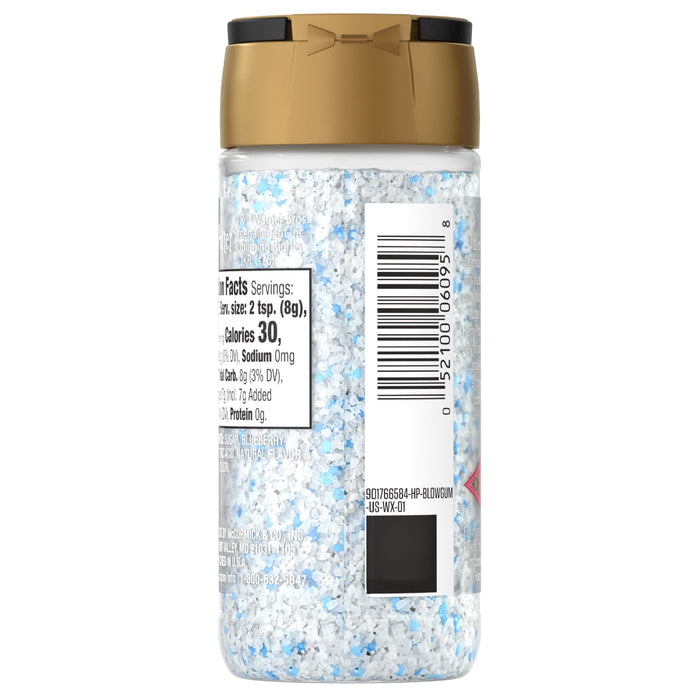 The back of the Mccormick, 3.43 Oz container of blue and white sugar crystals, showing the nutrition facts, ingredients, and manufacturer information.