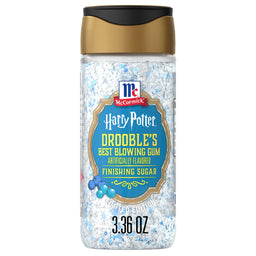 A clear shaker bottle of Mccormick Harry Potter Drooble'S Best Blowing Gum Finishing Sugar, 3.36 Oz, shows the white and blue sugar crystals inside.
