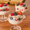 Three elegant glass cups filled with a creamy berry parfait are beautifully finished with a sprinkle of Mccormick Harry Potter Drooble'S Best Blowing Gum Finishing Sugar, 3.36 Oz.