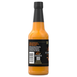 A bottle of Char Man Habanero Sauce with a black label and cap.