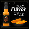 A bottle of Yellow Chili Elixir hot sauce is featured alongside the text 2025 Flavor of the Year.