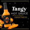 A bottle of Flavorista hot sauce is displayed, highlighting its tangy and fruity sweetness.