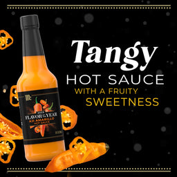A bottle of Flavorista hot sauce is displayed, highlighting its tangy and fruity sweetness.