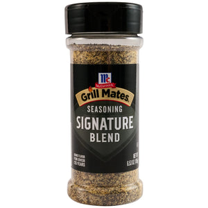 A container of McCormick Grill Mates Signature Blend Seasoning.