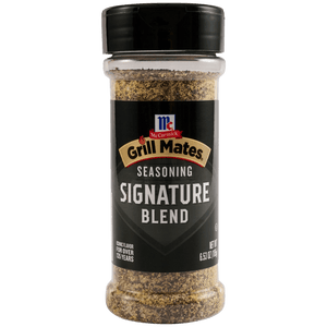 A clear plastic bottle of Mccormick Grill Mates Mc Gm Signature Blend Seas 6.53 Oz seasoning with a black label and cap, filled with a coarse blend of dark and light spices.