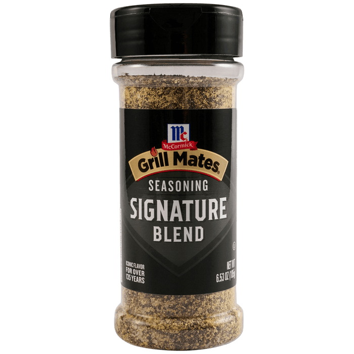 A clear plastic bottle of Mccormick Grill Mates Mc Gm Signature Blend Seas 6.53 Oz seasoning with a black label and cap, filled with a coarse blend of dark and light spices.
