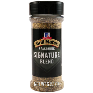 A clear plastic bottle of McCormick Grill Mates Signature Blend Seasoning, 6.53 Oz Bottle, is shown against a white background.