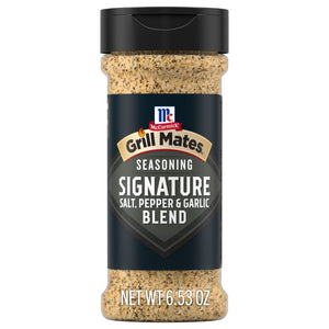 A clear plastic bottle of McCormick Grill Mates Signature Blend Seasoning, 6.53 Oz Bottle, is shown against a white background.