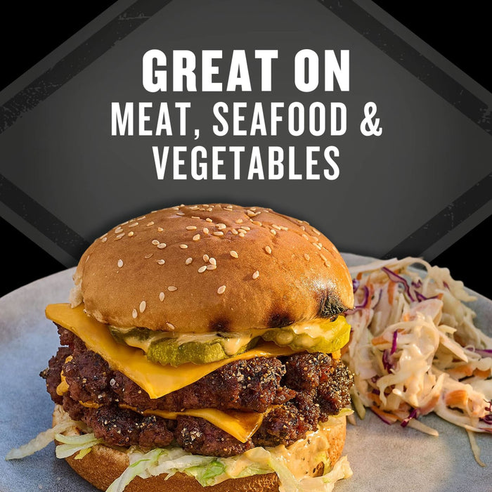 A juicy double cheeseburger seasoned with Grill Mates Signature Blend Seasoning, 6.53 Oz Bottle, is plated with coleslaw, demonstrating its use as a product that is great on meat, seafood, and vegetables.