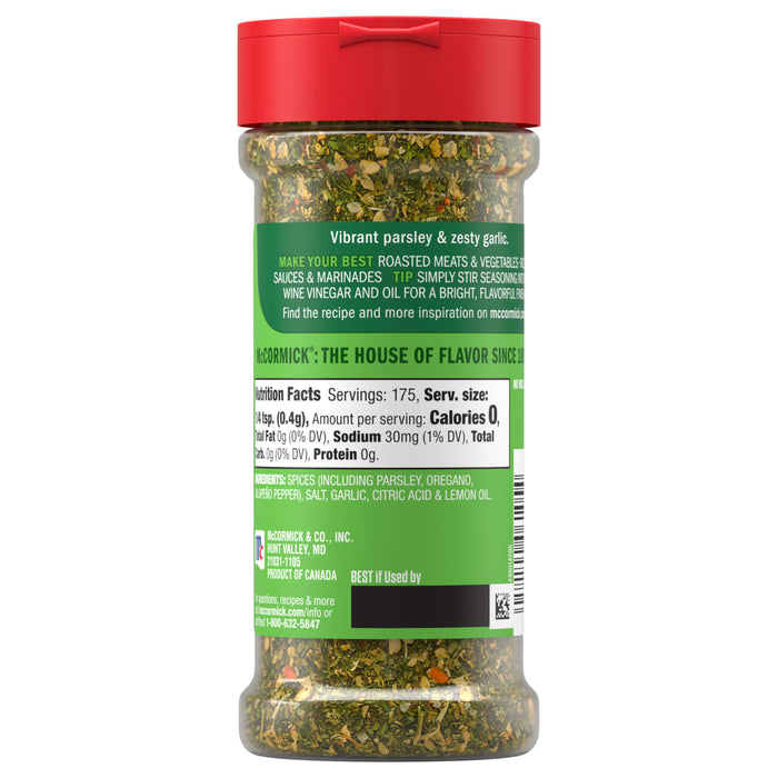 The back of a bottle of Mccormick, 2.47 Oz spice blend displays the nutrition facts, a list of ingredients including parsley and garlic, and usage suggestions.