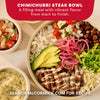 An appetizing overhead view of a Chimichurri Steak Bowl, presented as a recipe idea for Mccormick Chimichurri Flavored Seasoning, 2.47 Oz, filled with sliced steak, rice, beans, and fresh toppings.