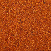 A detailed, top-down macro shot reveals the coarse texture and vibrant red and orange colors of Mccormick Chili Garlic Seasoning, 5.22 Oz.