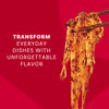 Chopsticks lift noodles coated in a savory sauce, demonstrating how Mccormick Chili Garlic Seasoning, 5.22 Oz can transform everyday dishes with unforgettable flavor.