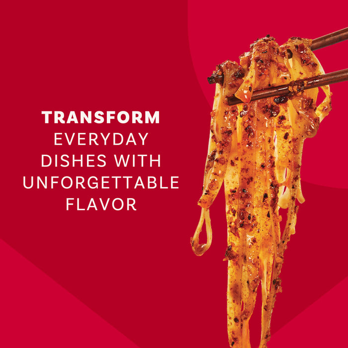 Chopsticks lift noodles coated in a savory sauce, demonstrating how Mccormick Chili Garlic Seasoning, 5.22 Oz can transform everyday dishes with unforgettable flavor.
