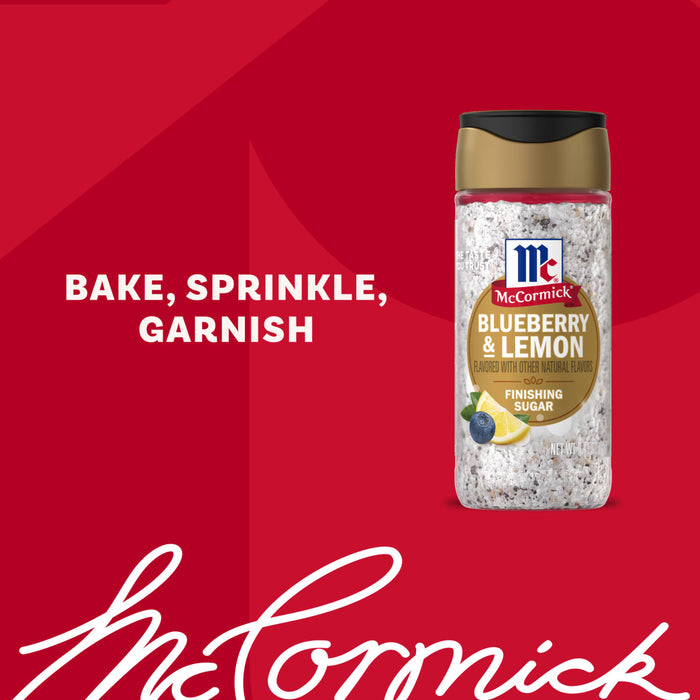 A bottle of Mccormick Blueberry And Lemon Finishing Sugar, 3.43 Oz, is displayed against a red background with the words BAKE, SPRINKLE, GARNISH and the McCormick logo.