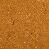 A close-up, top-down view shows the rich, orange-brown texture of Mccormick Moroccan Style Seasoning, 4.62 Oz, revealing a blend of fine and coarse spices.