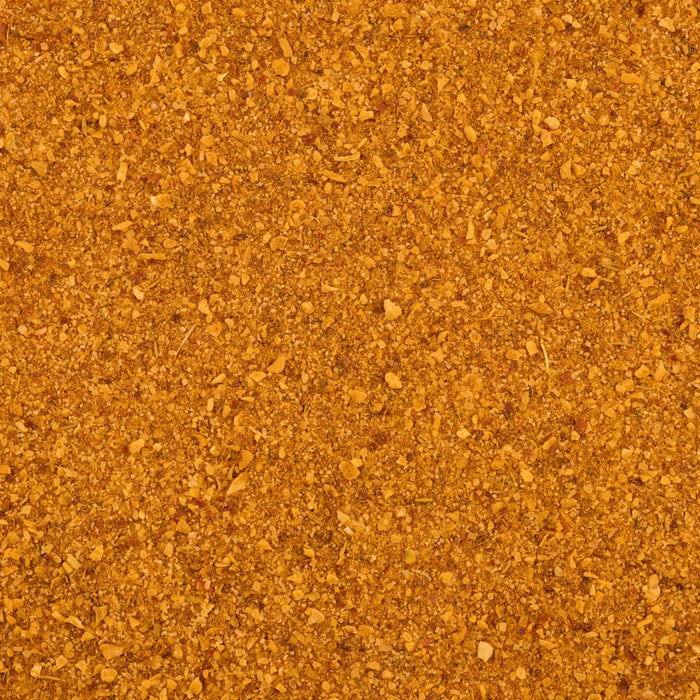 A close-up, top-down texture shot shows the varied granules of Mccormick Korean Style Seasoning, 5.96 Oz.