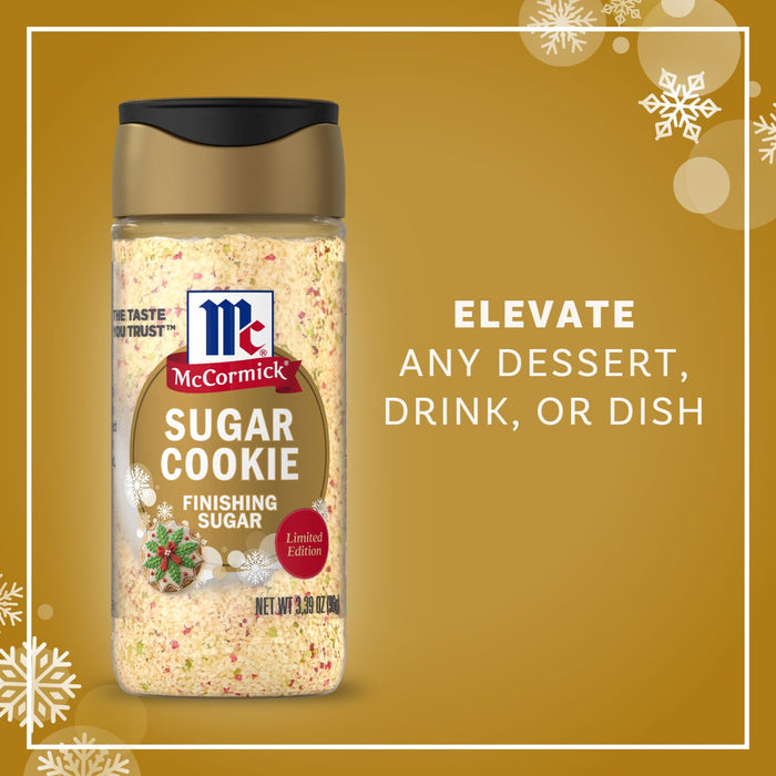 A promotional graphic for Mccormick Sugar Cookie Finishing Sugar, 3.39 Oz features a bottle of the festive topping against a gold background with snowflakes and text stating it can elevate any dessert, drink, or dish.
