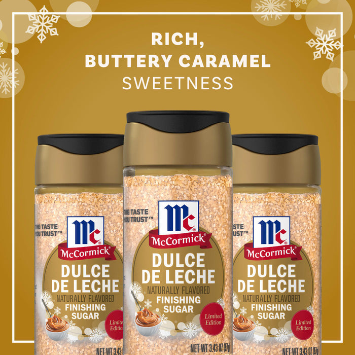 Three bottles of Mccormick Dulce De Leche Finishing Sugar, 3.43 Oz are displayed against a festive gold background with snowflakes to highlight its rich and buttery caramel sweetness.