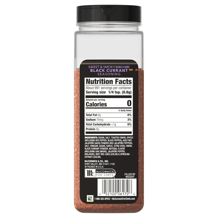 A bottle of Black Currant seasoning with a visible nutrition facts label.