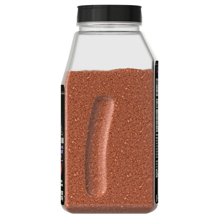 A bottle of chili powder with a grip on the side.